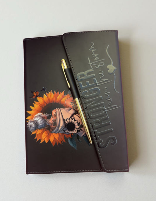 Stronger than the storm Journal with pen (black cover)