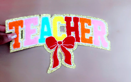 Teacher with Red Bow Patch